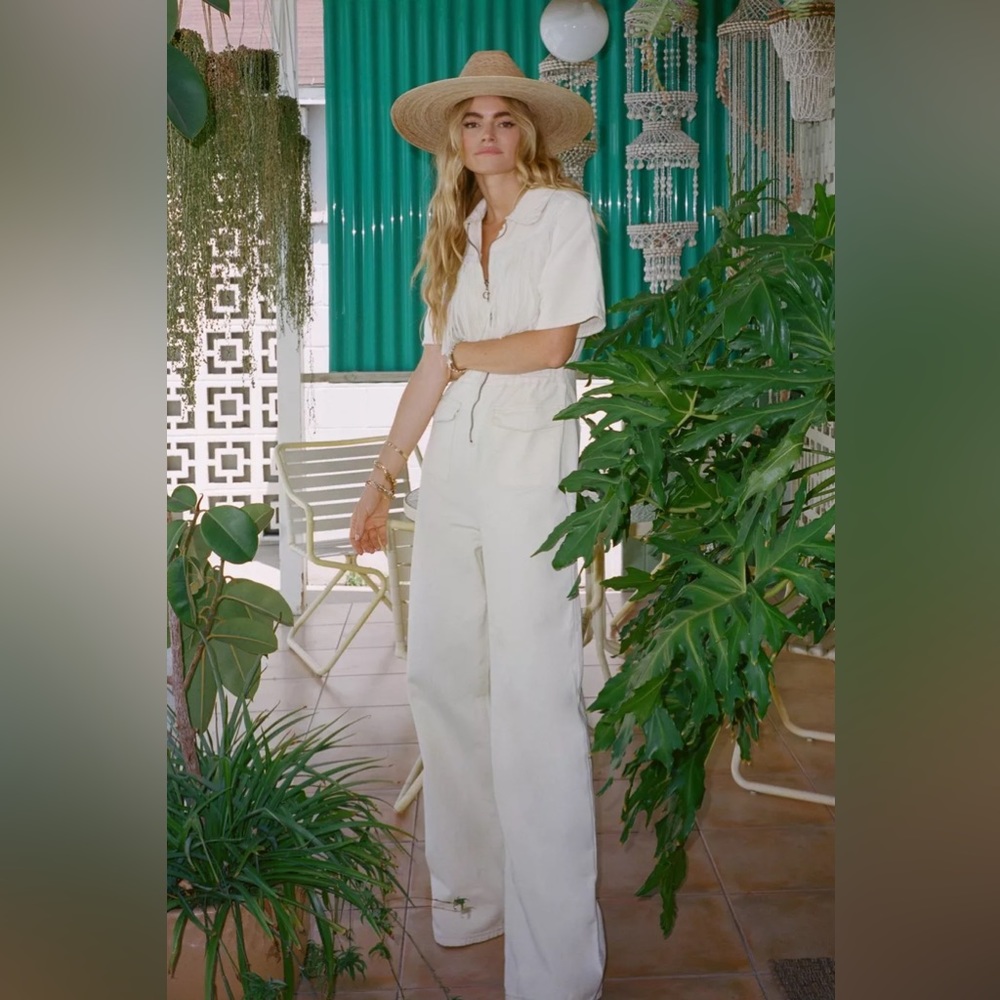Nasty Gal off white denim jumpsuit with fringe detail size 4
